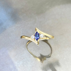 Unique Marquise Cut Tanzanite and Diamond Swish Yellow Gold Ring