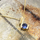 Unique Multiple Swish Tanzanite Yellow Gold Pendant
