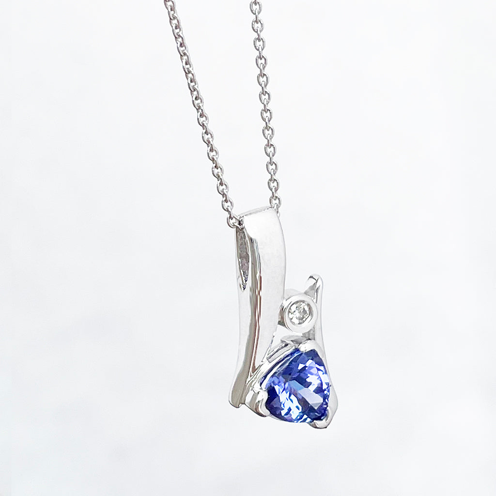 Unique Trilliant Tanzanite and Round Bezel Set Diamond Pendant