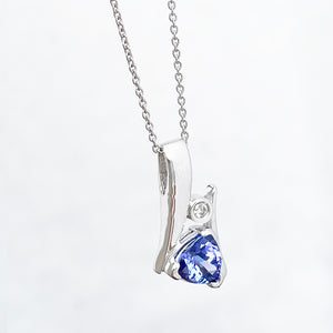 Unique Trilliant Tanzanite and Round Bezel Set Diamond Pendant
