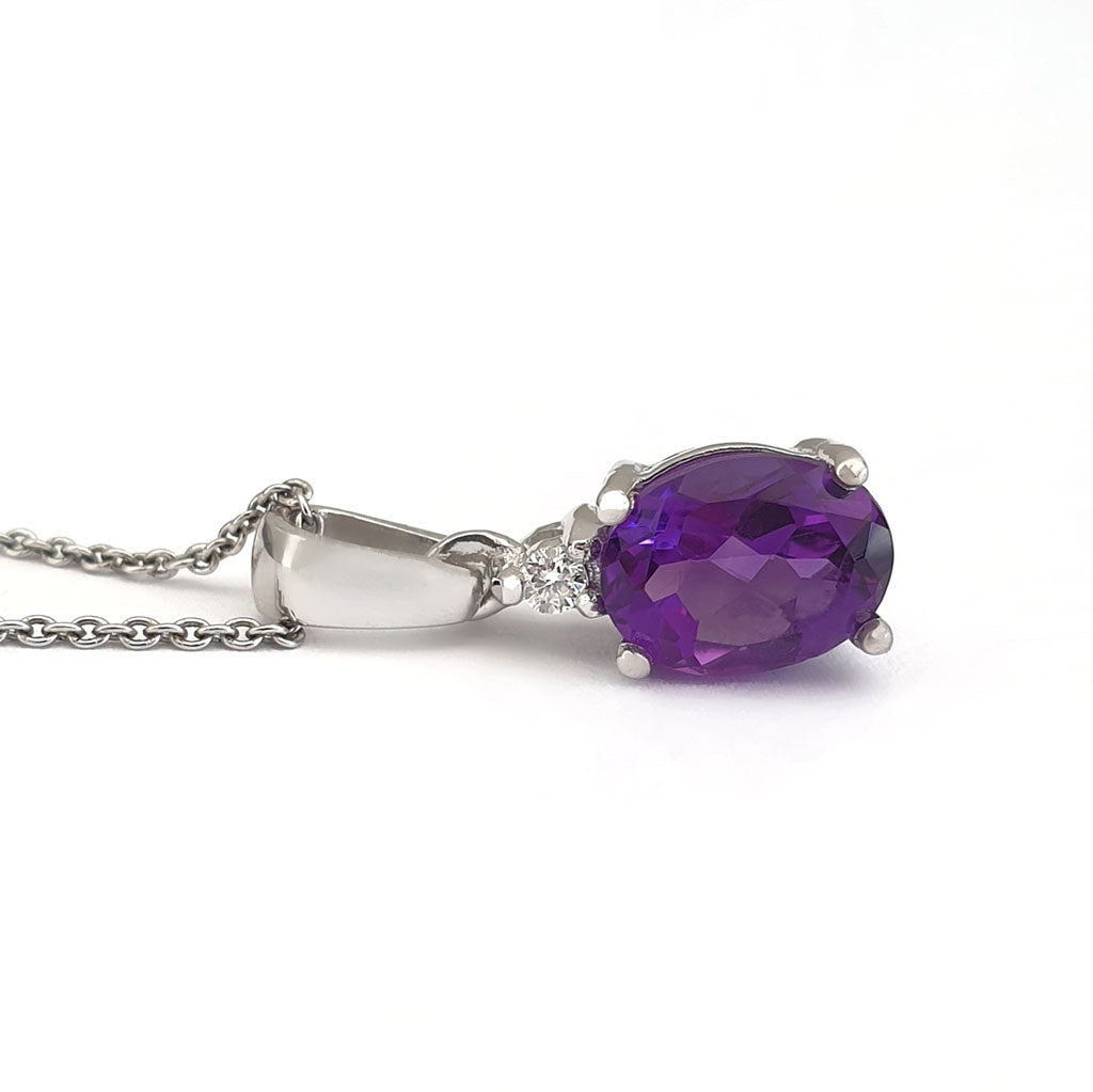 White Gold Oval Cut Amethyst and Diamond Highlight Pendant