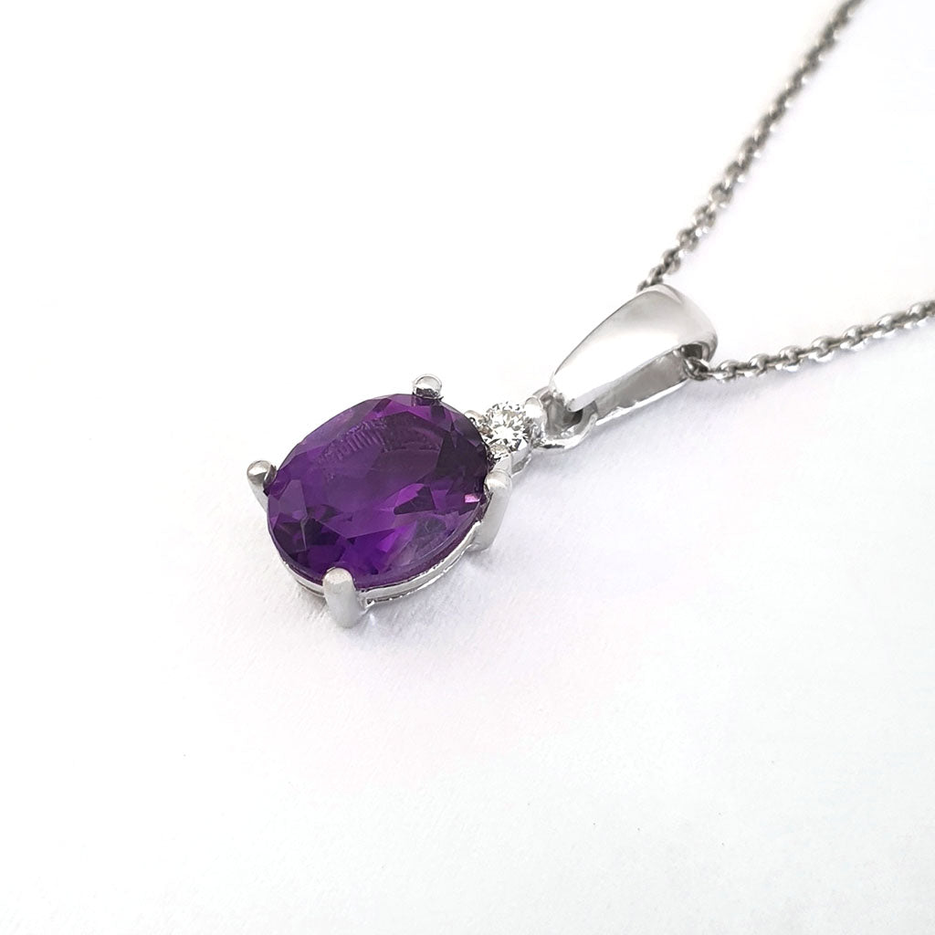 White Gold Oval Cut Amethyst and Diamond Highlight Pendant