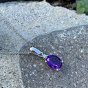 White Gold Oval Cut Amethyst and Diamond Highlight Pendant