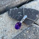 White Gold Oval Cut Amethyst and Diamond Highlight Pendant