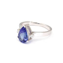 Wide White Gold Band, Pear Cut Tanzanite with Petite Diamond Accents Ring