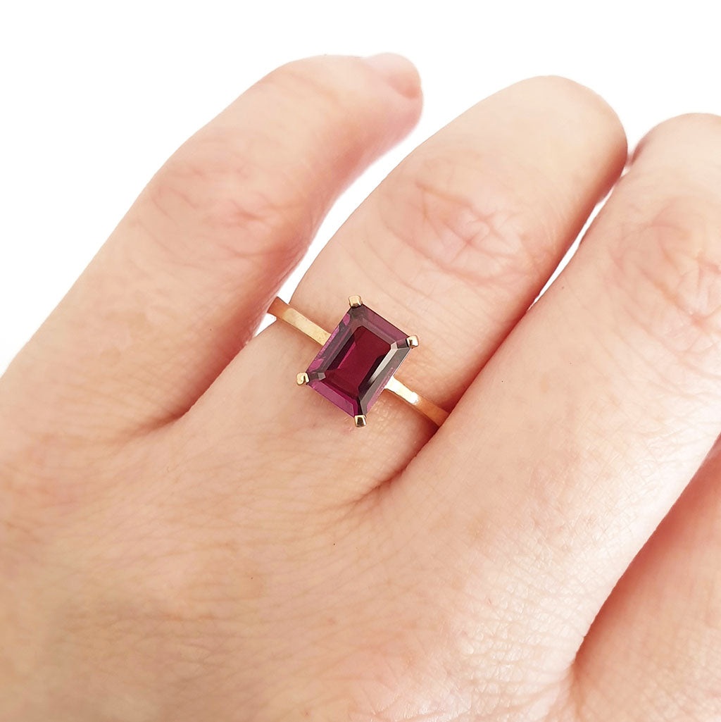 Solitaire Four Claw Emerald Cut Grape Garnet Ring – Afrogem Jewellers